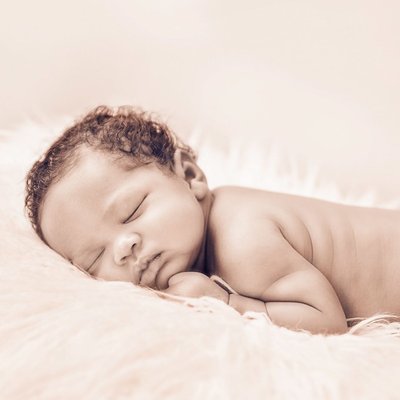 Serenity: Captivating Sepia-Toned Baby Portrait