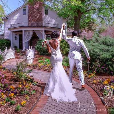 Joyful Newlyweds Celebrating at Carl House Wedding.