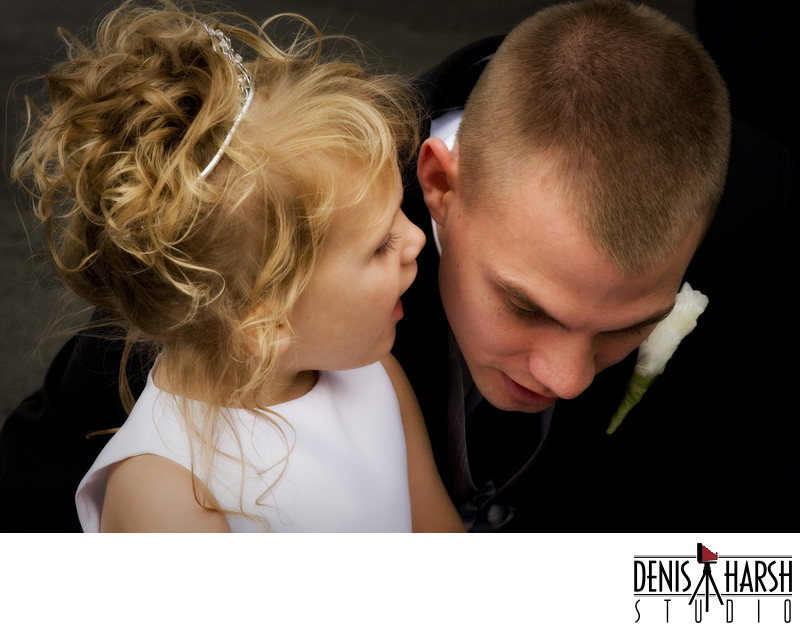 Cutest Flower Girl whispers question in her Dad's ear
