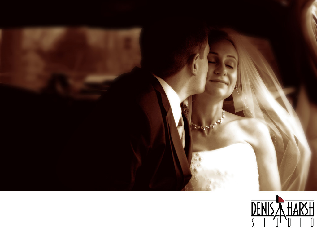 Wedding Photography Bloomington Normal Kiss in Limo
