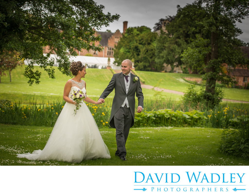 Wedding day walk for the couple at gorgeous Grafton Manor in Bromsgrove