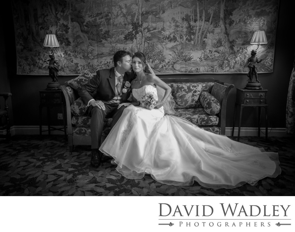 Bride & Groom sitting together on their wedding in New Hall Hotel. 