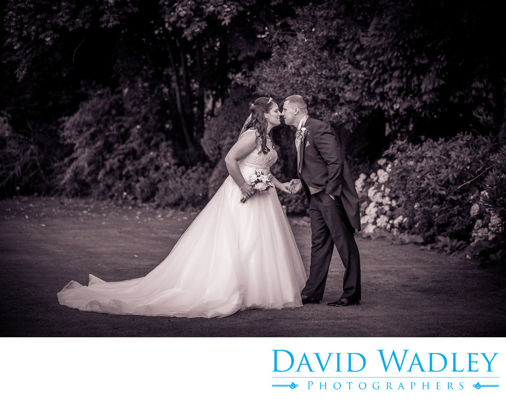 Bride & Groom holding hands at Nailcote Hall.