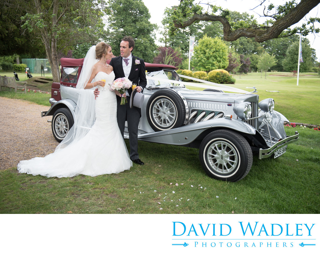 Silver wedding car at Nailcote Hall.