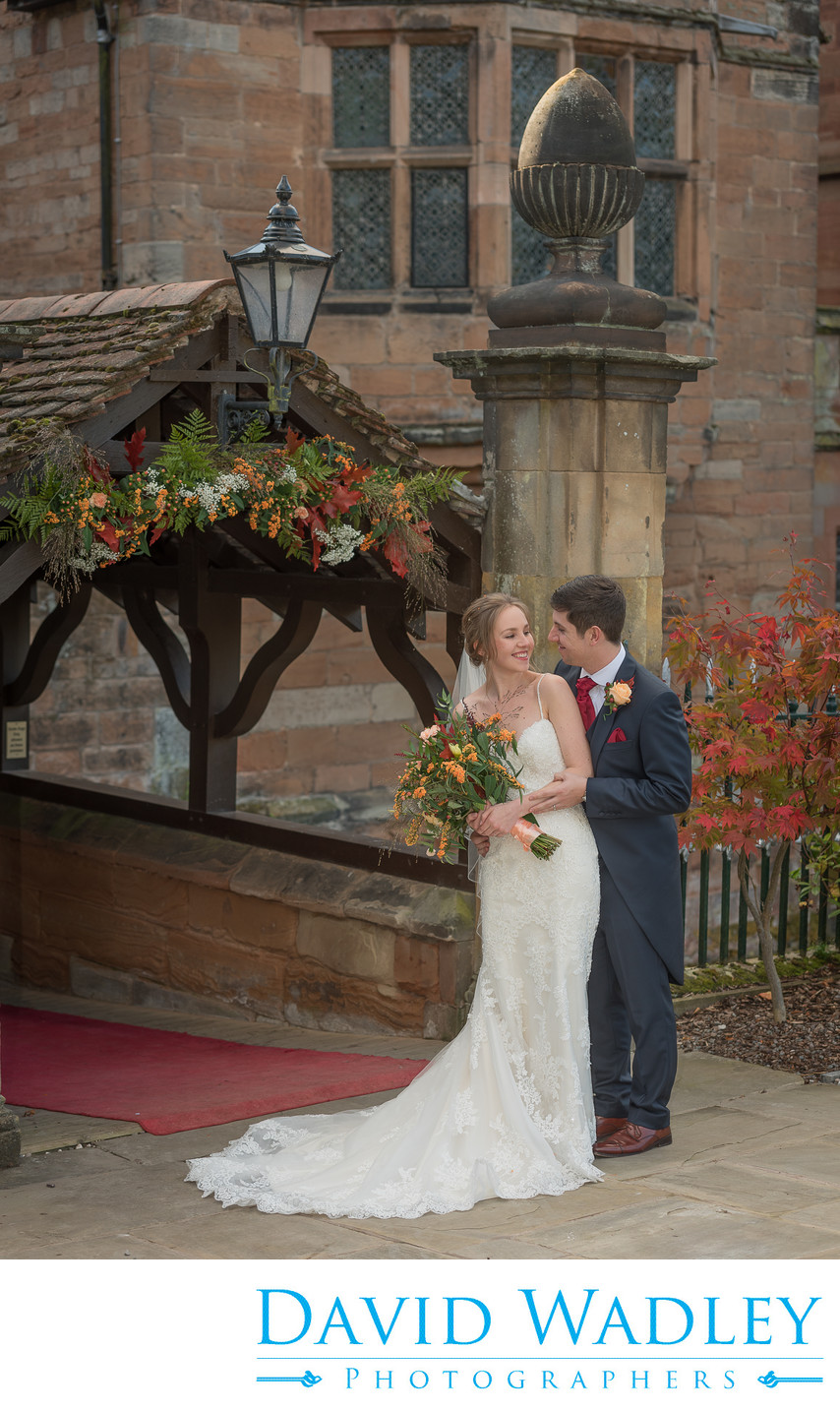 Bride & Groom photographed at front of New Hall Hotel in Sutton Coldfield.