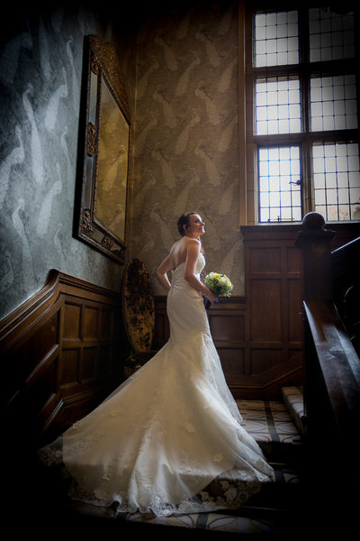 The stunning staircase at Moxhull Hall with the bride on her Wedding Day.