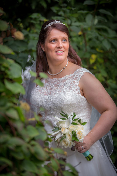 Bride in garden at Nailcote Hall