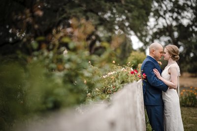 Couple on Fence Best Wedding Photographers Sacramento 