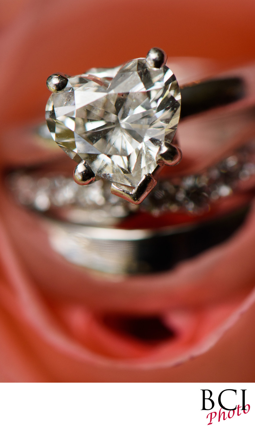 Wedding Ring Closeup with Heart Shaped Diamond Ring