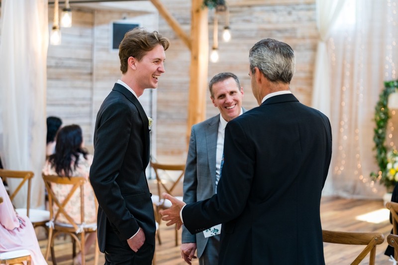 Groom with Family Before Ramble Creek Wedding