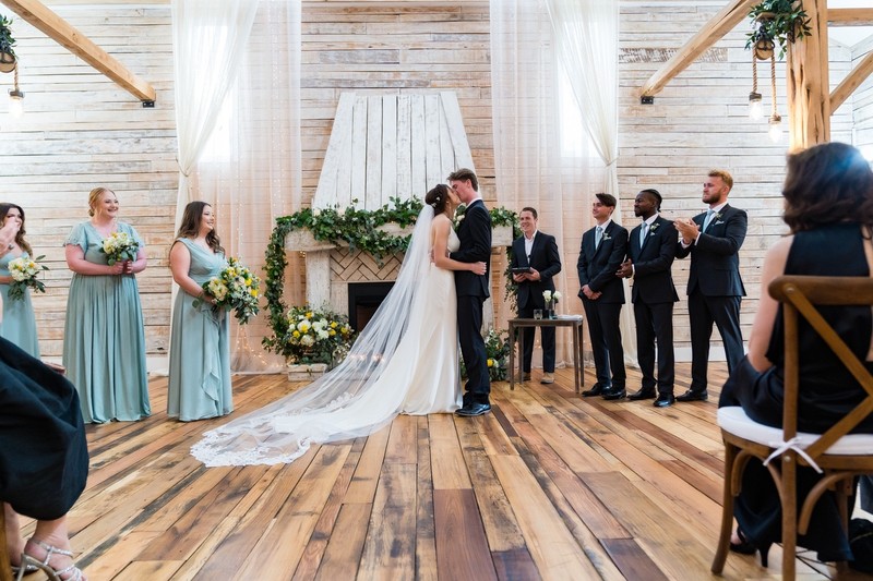 First Kiss at Ramble Creek Wedding Venue