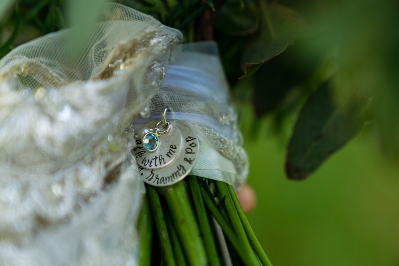 Sentimental Bouquet Charm Photo at Ramble Creek Wedding