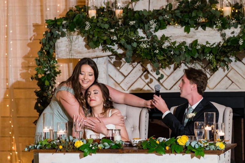 Maid of Honor Hug – Ramble Creek Wedding