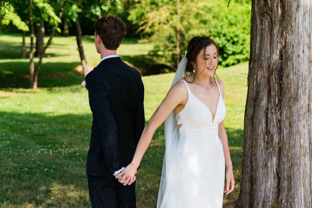 First Touch Connection Before Ramble Creek Wedding