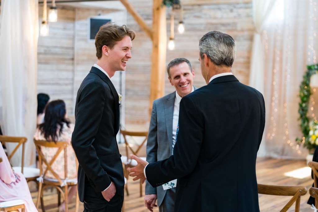 Groom with Family Before Ramble Creek Wedding