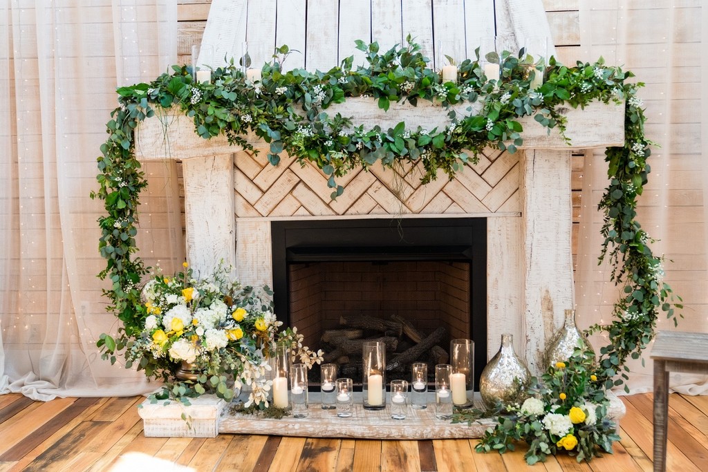 Ceremony Fireplace Decor at Ramble Creek Wedding Venue