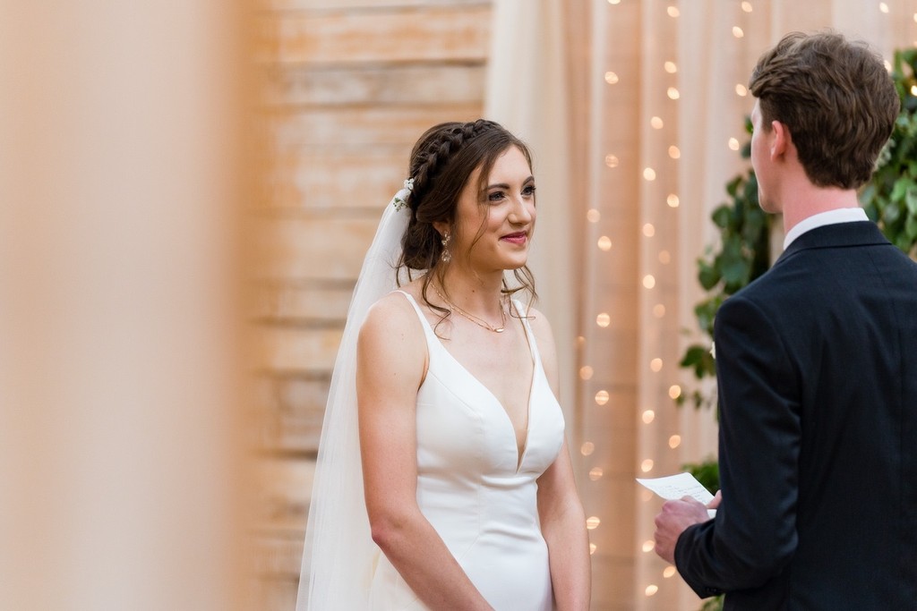 Bride Smiling During Vows at Ramble Creek Wedding