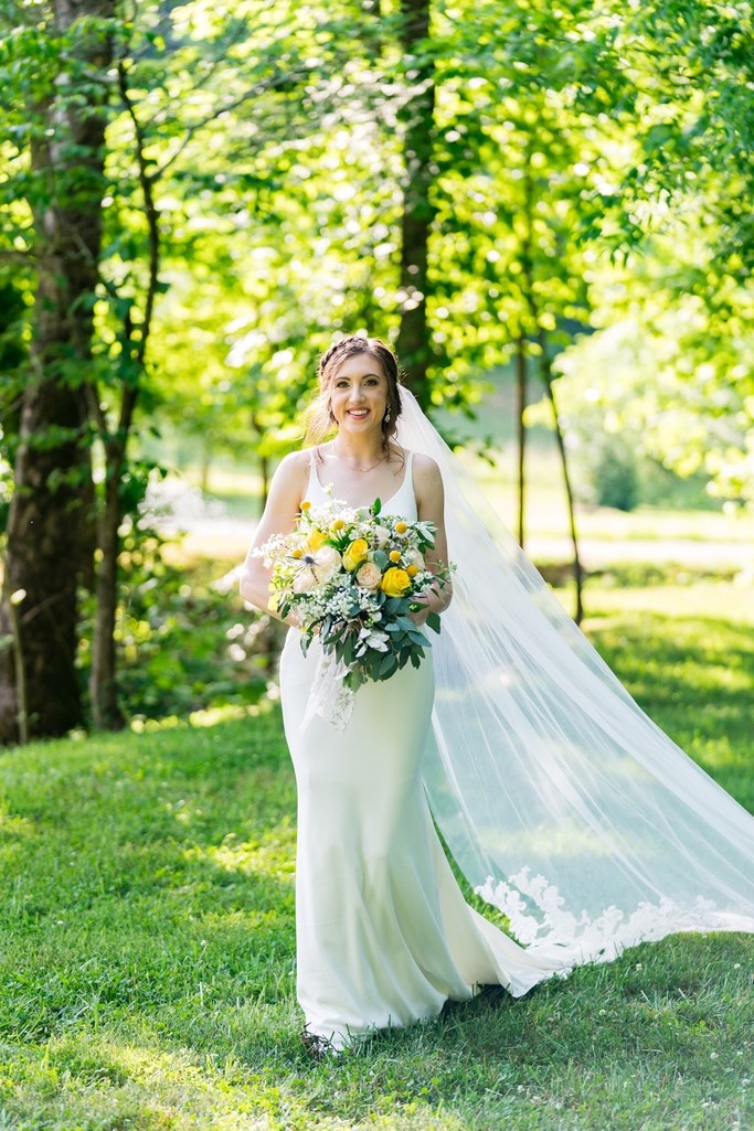 Bride in Garden at Ramble Creek Wedding
