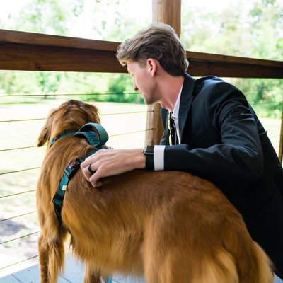 Groom and Golden Retriever Bonding at Ramble Creek