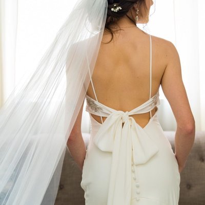 Back of Bride’s Dress with Bow at Ramble Creek