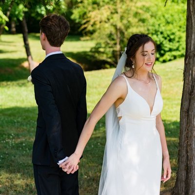 First Touch Connection Before Ramble Creek Wedding