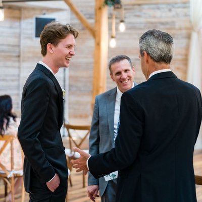 Groom with Family Before Ramble Creek Wedding