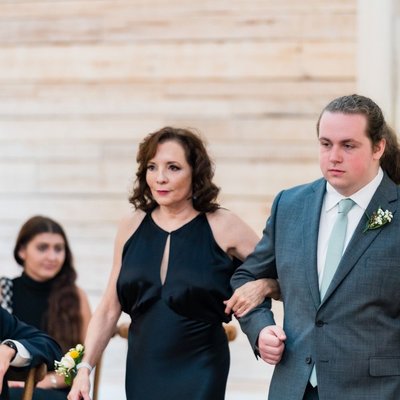 Groom's Brother Escorting Mother-In-Law Down the Aisle