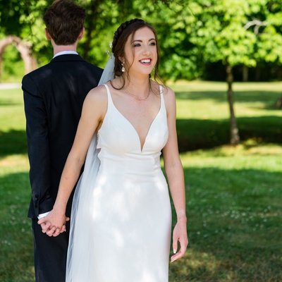 Ramble Creek Wedding First Touch Between Bride and Groom