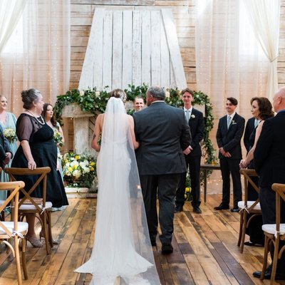Bride Walking Down the Aisle with Father