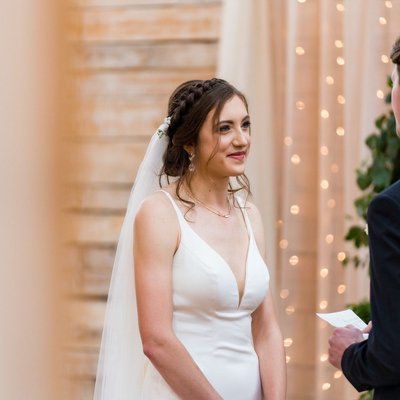 Bride Smiling During Vows at Ramble Creek Wedding