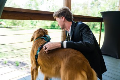 Groom and Golden Retriever Bonding at Ramble Creek