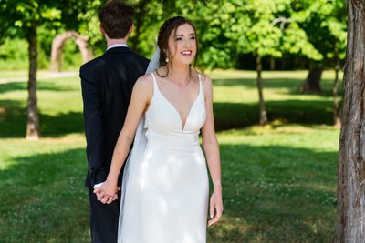 Ramble Creek Wedding First Touch Between Bride and Groom