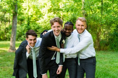 Groomsmen Candid Moment at Ramble Creek Wedding