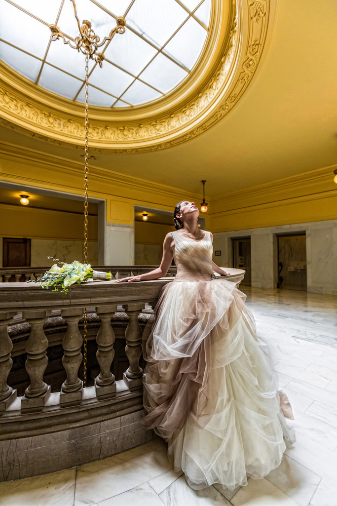 Bride Poses On Fourth Floor Landing San Francisco City Hall