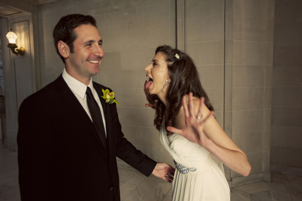 Silly candid moment bride and groom
