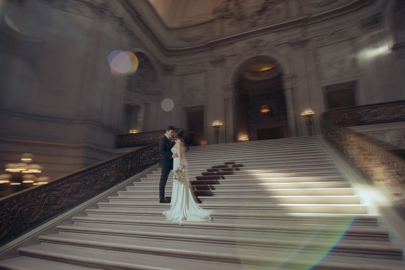 Artificial light wedding image inside San Francisco City Hall