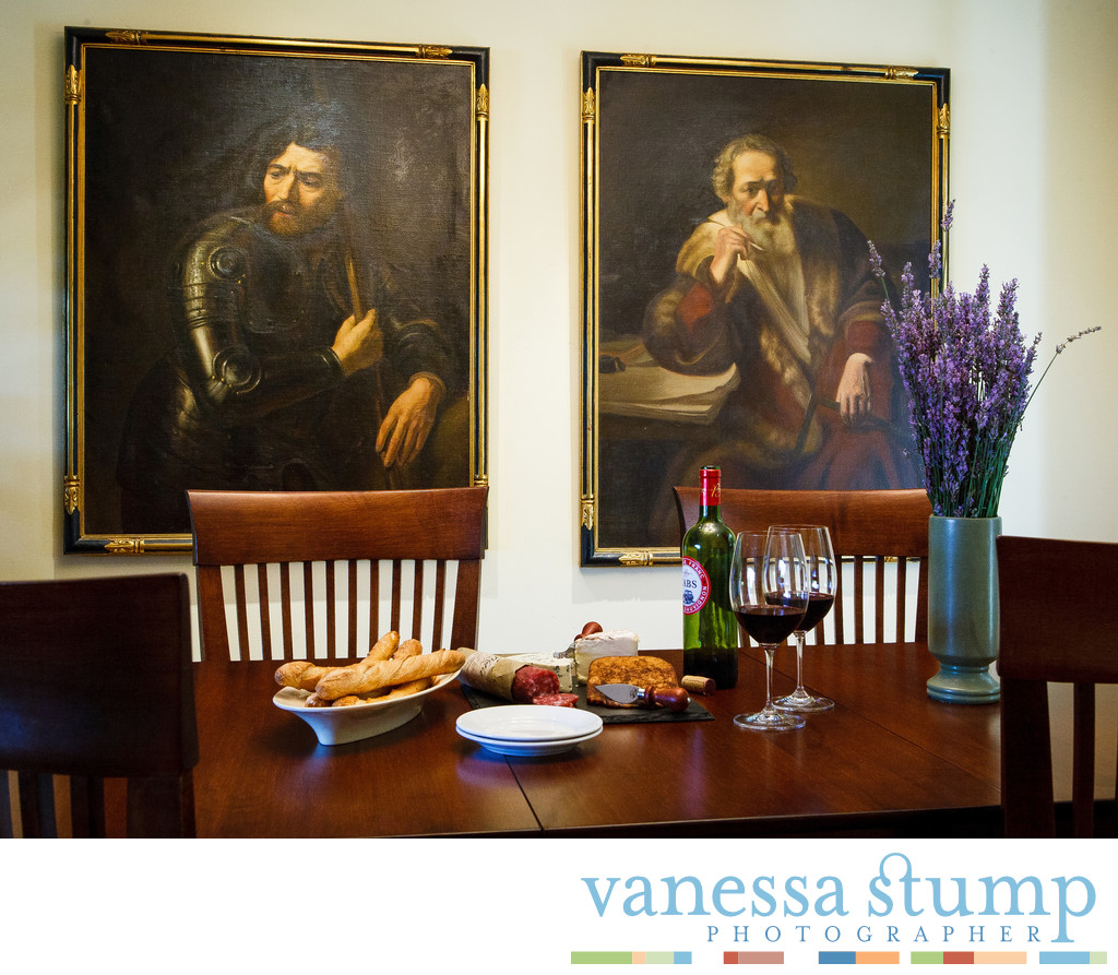 Happy Hour with two somber paintings