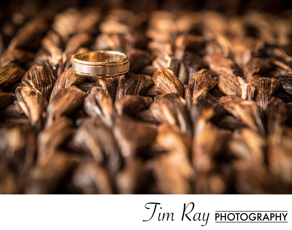 Grooms Ring on textured wicker table