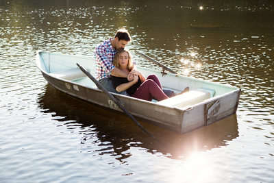 Engagement Portrait in Boat at sunset