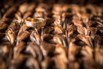 Grooms Ring on textured wicker table