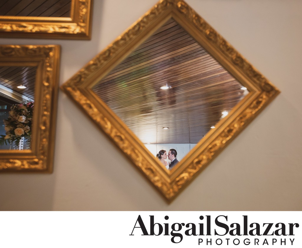 Indoor bride and groom portrait: Mirror reflection