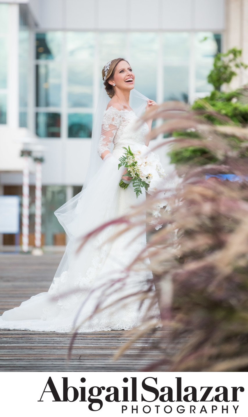Outdoor bridal portrait: Smiling and lovely bride