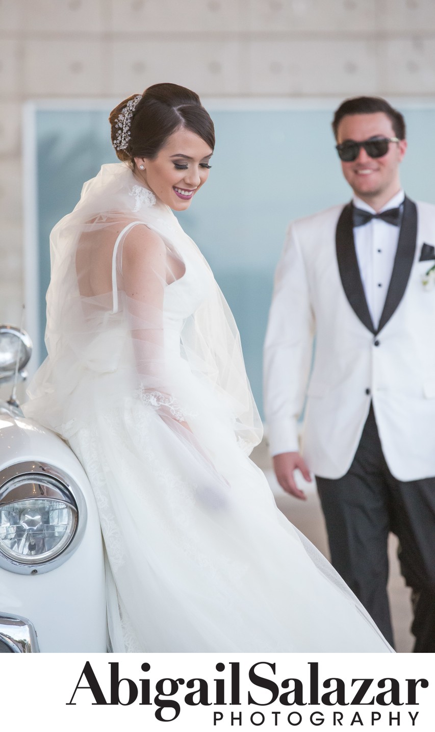 Wedding car portrait:  Stunning bride & cool groom