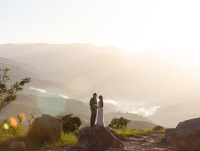 Mountain top wedding portrait: Sublime bride & groom