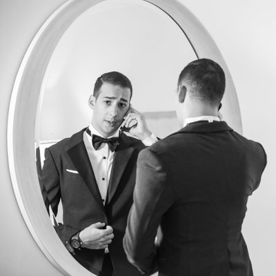 Getting ready: Handsome groom on the phone