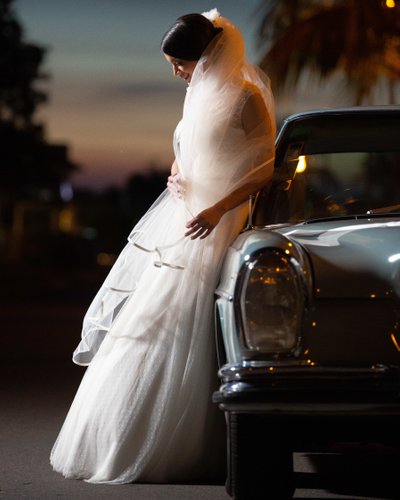 Bridal portrait: Bride & classic wedding car