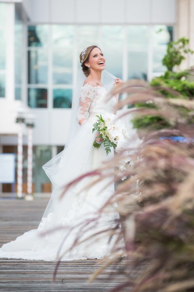 Outdoor bridal portrait: Smiling and lovely bride