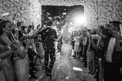 Confetti Wedding Exit Through Massive Floral Entrance
