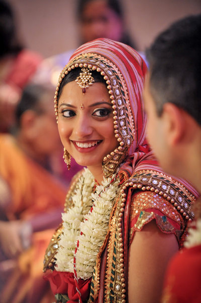 Houston South Asian Wedding Bride Smiles At Groom