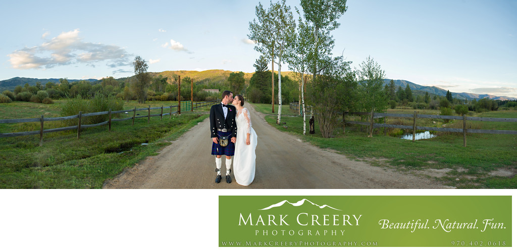 Bride & Groom kissing panorama at Perry Mansfield